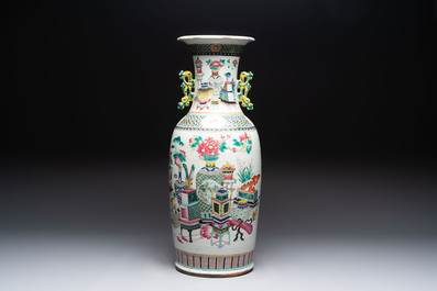 A Chinese famille rose vase and two Canton famille rose vases, 19/20th C.