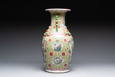 A Chinese famille rose vase and two Canton famille rose vases, 19/20th C.