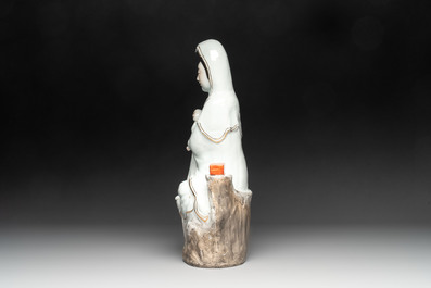 A Chinese gilt- and iron-red-decorated white-glazed figure of Guanyin, Cai Yongxin 蔡永新造 mark, 20th C.
