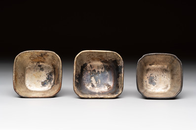 Seven Chinese silver-lined laque burgaut&eacute; wine cups and two stands, Kangxi