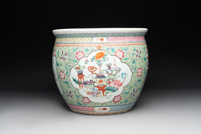 A Chinese famille rose lime-green-ground jardini&egrave;re with birds, flowers and antiquities, 19th C.
