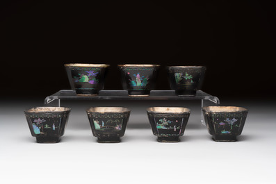 Seven Chinese silver-lined laque burgaut&eacute; wine cups and two stands, Kangxi