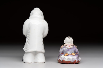 A Chinese Dehua blanc de Chine libation cup, a famille rose cup and two figures, 19th C.