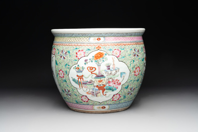 A Chinese famille rose lime-green-ground jardini&egrave;re with birds, flowers and antiquities, 19th C.