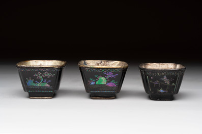 Seven Chinese silver-lined laque burgaut&eacute; wine cups and two stands, Kangxi
