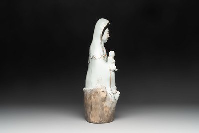 A Chinese gilt- and iron-red-decorated white-glazed figure of Guanyin, Cai Yongxin 蔡永新造 mark, 20th C.