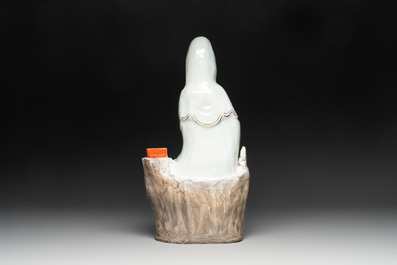 A Chinese gilt- and iron-red-decorated white-glazed figure of Guanyin, Cai Yongxin 蔡永新造 mark, 20th C.