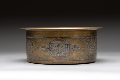 Three 'calligraphic' brass vessels, Qajar, 19/20th C.