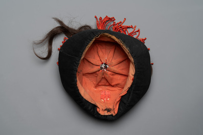 A Chinese mandarin official's court hat, an embroidered silk 'phoenix' panel and a skirt, 19th C.