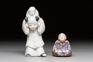A Chinese Dehua blanc de Chine libation cup, a famille rose cup and two figures, 19th C.