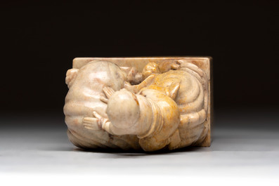 A Chinese soapstone carving of a boy riding an elephant, 20th C.