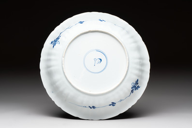 A Chinese blue and white dish with floral design, artemisia leaf mark, Kangxi