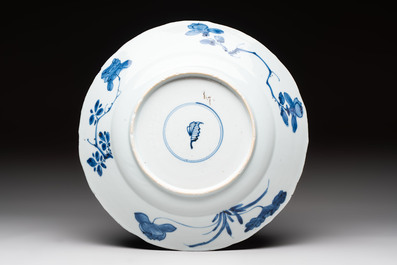 A Chinese blue and white dish with floral design, artemisia leaf mark, Kangxi