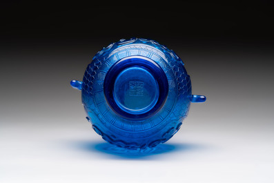 A Chinese blue Peking glass vase with Arabic inscription, Qianlong mark and possibly of the period