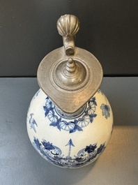 A blue and white Dutch Delft pewter-mounted armorial jug, late 17th C.