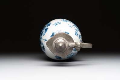 A blue and white Dutch Delft pewter-mounted armorial jug, late 17th C.