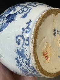 A blue and white Dutch Delft pewter-mounted armorial jug, late 17th C.