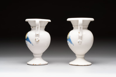 A pair of blue, white and yellow Dutch Delft altar vases, late 17th C.