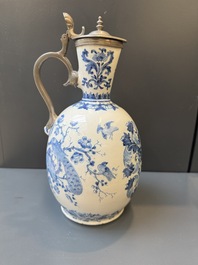 A blue and white Dutch Delft pewter-mounted armorial jug, late 17th C.