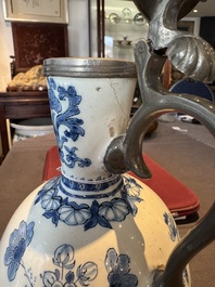 A blue and white Dutch Delft pewter-mounted armorial jug, late 17th C.