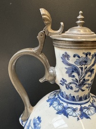 A blue and white Dutch Delft pewter-mounted armorial jug, late 17th C.