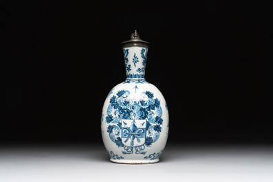 A blue and white Dutch Delft pewter-mounted armorial jug, late 17th C.