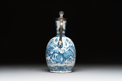 A blue and white Dutch Delft pewter-mounted armorial jug, late 17th C.