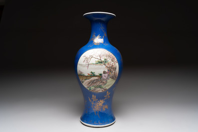 A Chinese famille rose powder-blue-ground vase, 19th C.