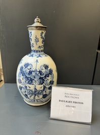 A blue and white Dutch Delft pewter-mounted armorial jug, late 17th C.
