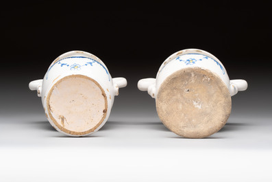 A pair of blue, white and yellow Dutch Delft altar vases, late 17th C.