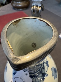 A blue and white Dutch Delft pewter-mounted armorial jug, late 17th C.