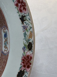 A Chinese famille rose armorial soup plate with the arms of Mertins impaling Peck for the English market, Yongzheng, ca. 1725