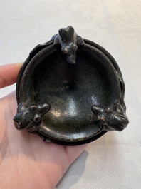 A rare Chinese black-glazed two-tier oil lamp with three rats, Ming
