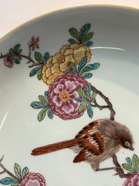 A pair of Chinese Dutch-decorated plates with birds among flowering branches, 18th C.