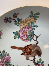 A pair of Chinese Dutch-decorated plates with birds among flowering branches, 18th C.