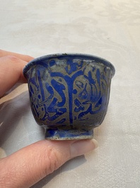 A rare pair of Chinese sacrificial blue-glazed and engraved cups for the Islamic market, 18th C.