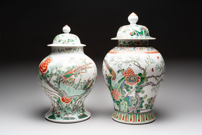 Two Chinese famille verte 'birds and flowers' vases and covers, 19th C.