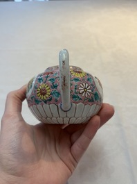 A Chinese famille rose teapot and stand, and a famille rose black-ground teapot, Yongzheng/Qianlong