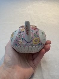 A Chinese famille rose moulded teapot and stand with floral design, Yongzheng/Qianlong