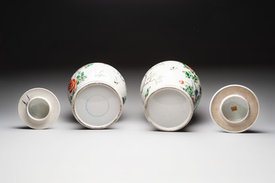 Two Chinese famille verte 'birds and flowers' vases and covers, 19th C.