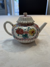 A Chinese famille rose teapot and stand, and a famille rose black-ground teapot, Yongzheng/Qianlong