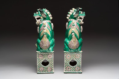 A pair of large Chinese verte biscuit Buddhist lions, 19th C.