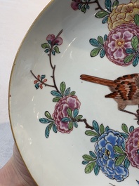 A pair of Chinese Dutch-decorated plates with birds among flowering branches, 18th C.