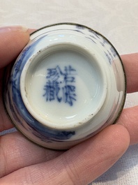 A pair of Chinese blue and white 'Bleu de Hue' cups with calligraphy for the Vietnamese market, 19th C.