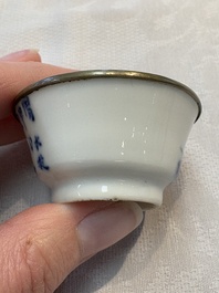 A pair of Chinese blue and white 'Bleu de Hue' cups with calligraphy for the Vietnamese market, 19th C.