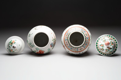 Two Chinese famille verte 'birds and flowers' vases and covers, 19th C.