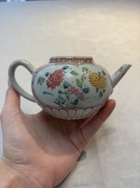 A Chinese famille rose moulded teapot and stand with floral design, Yongzheng/Qianlong