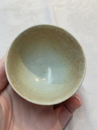 Thirteen Chinese blue and white 'Hatcher Cargo' cups and three celadon-glazed cups, Transitional period