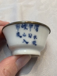 A pair of Chinese blue and white 'Bleu de Hue' cups with calligraphy for the Vietnamese market, 19th C.