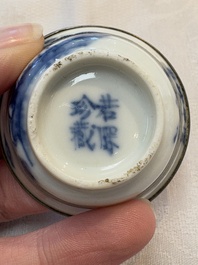 A pair of Chinese blue and white 'Bleu de Hue' cups with calligraphy for the Vietnamese market, 19th C.